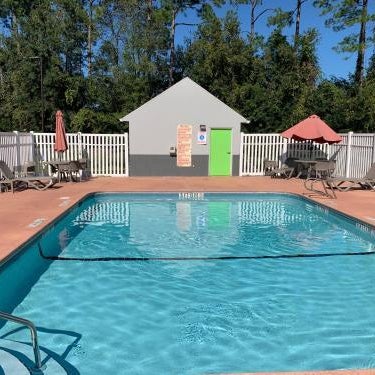 Magnolia Inn Extended Stay of Kingsland - New 2024 - Book a Kitchen Room - 12 Noon Check Out - Sleep In Late - Better Sleep - Ultra Sparkling - Pool open until until 4AM - Stay and Save Today - 24 Hour Front Desk - Premium Coffee Bar - Award Winning Inn Thumbnail