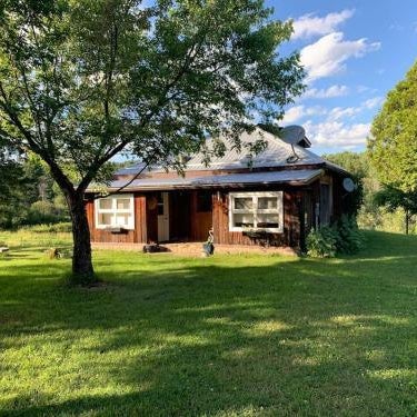 Tranquil private get away cottage in the woods Thumbnail