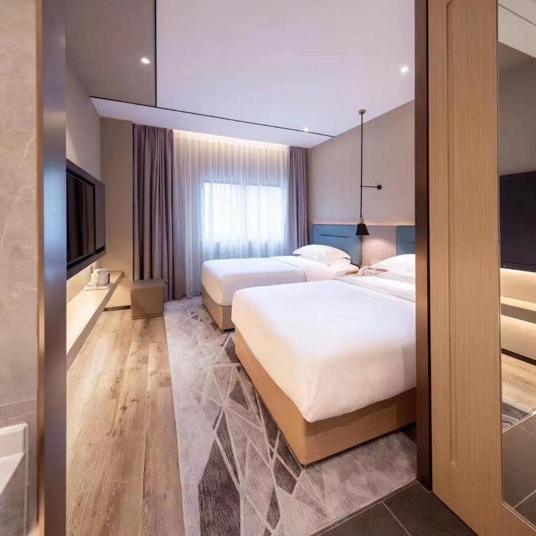 Chaoman Hotel -Guangzhou Shijing City Plaza Xiaoping Subway Station Thumbnail