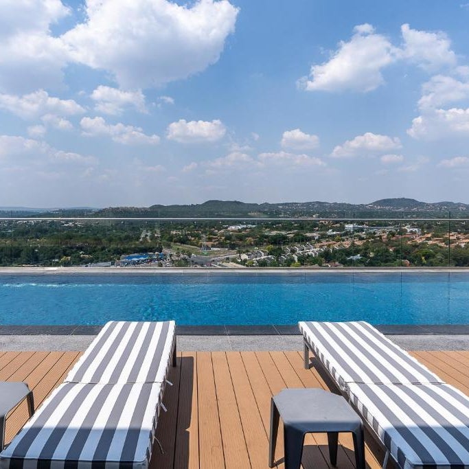Top Floor Menlyn Maine studio apartment with Stunning Views & No Load Shedding
