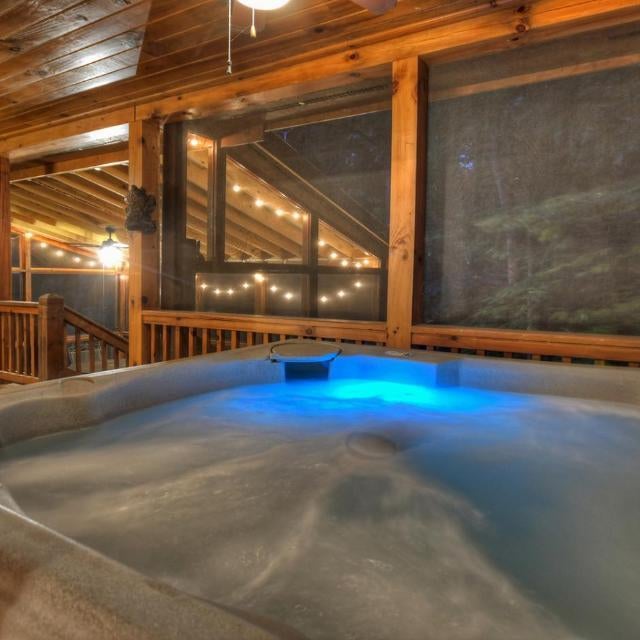 Four Seasons Wood-burning fireplace cozy hot tub comfy beds Thumbnail