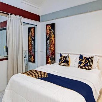 SPOT ON 92052 Aulya Homestay Syariah Near Tuanku Tambusai Stadium Thumbnail
