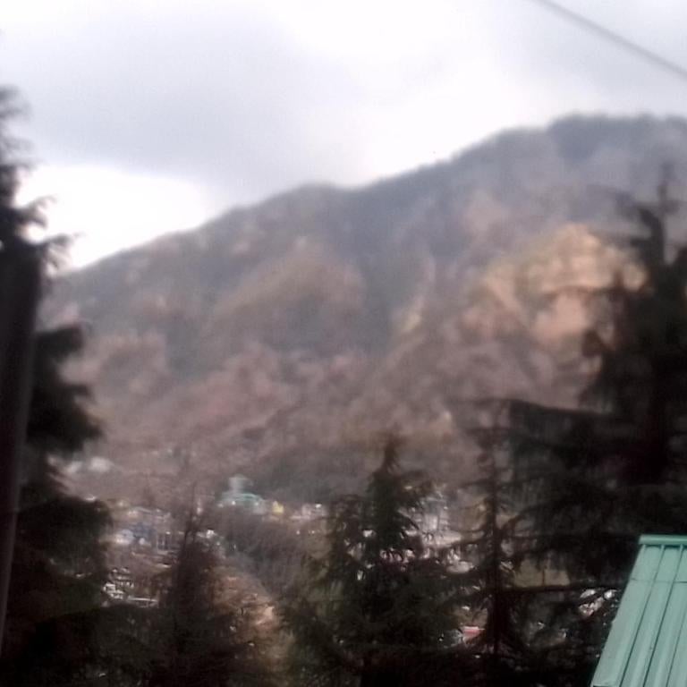 Himalayan Mountain Triund Hill Trekkers and Waterfalls View Hostel