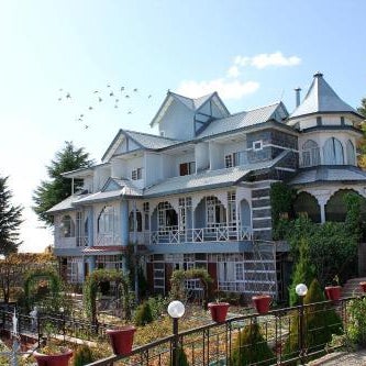 Snow King Retreat & Revolving Restaurant ,Cottages, Huts, Villas - Fagu Hill Top Kufri Shimla