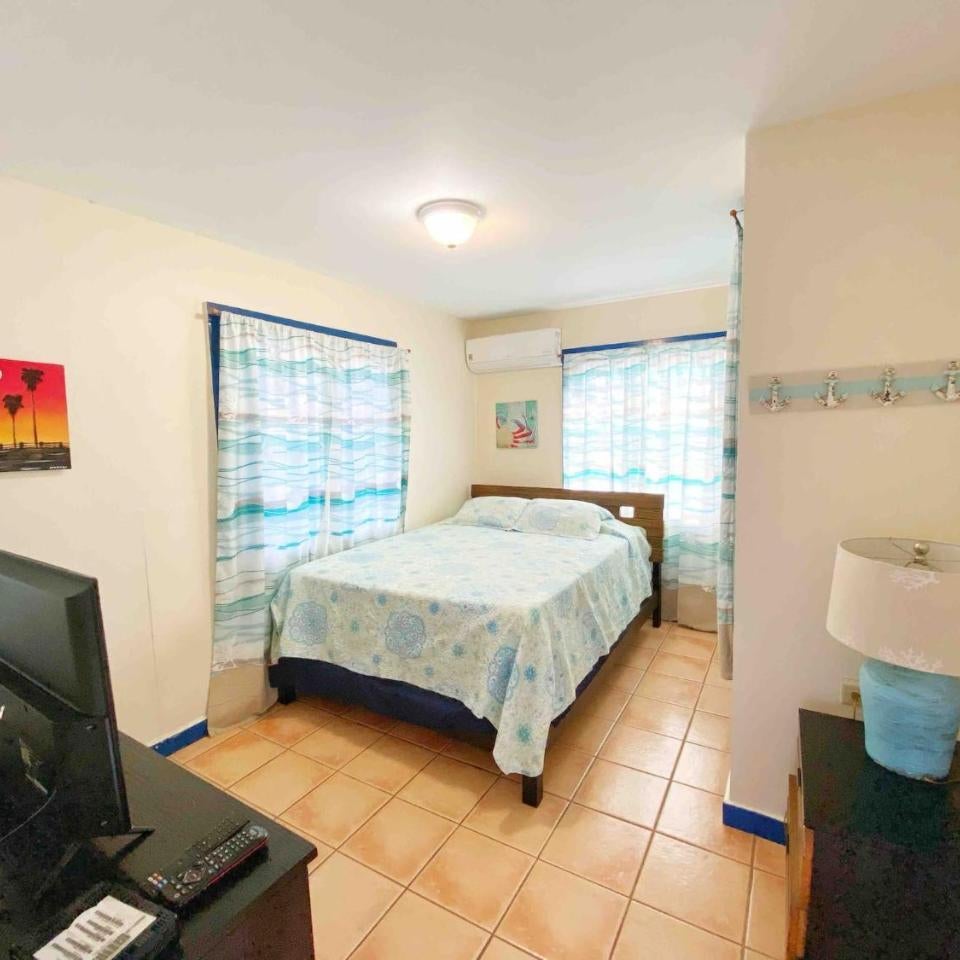 One Bedroom Getaway with Balcony by the Beach